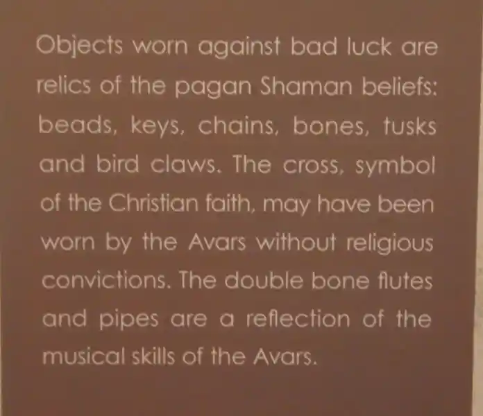 Swastika with animal head on the sides